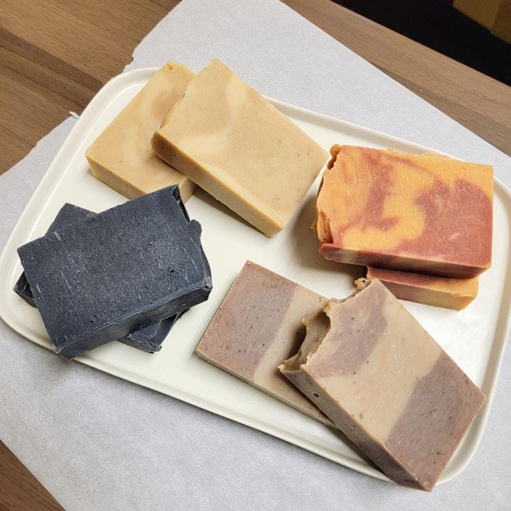 Our natural handmade soap is crafted with a thoughtful blend of nature-sourced ingredients, for a luxurious and nourishing cleansing experience. Rich botanical oils and butters provide deep hydration, while plant-based extracts soothe and protect the skin. We carefully select each ingredient—from creamy coconut milk and raw honey to mineral-rich clays and antioxidant-packed botanicals—to create a formulation that is both gentle and effective. No synthetic fragrances, no artificial colors.