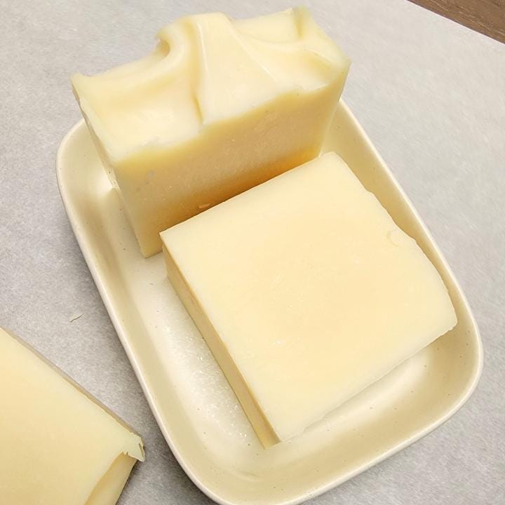 Our natural handmade soap is crafted with a thoughtful blend of nature-sourced ingredients, for a luxurious and nourishing cleansing experience. Rich botanical oils and butters provide deep hydration, while plant-based extracts soothe and protect the skin. We carefully select each ingredient—from creamy coconut milk and raw honey to mineral-rich clays and antioxidant-packed botanicals—to create a formulation that is both gentle and effective. No synthetic fragrances, no artificial colors.